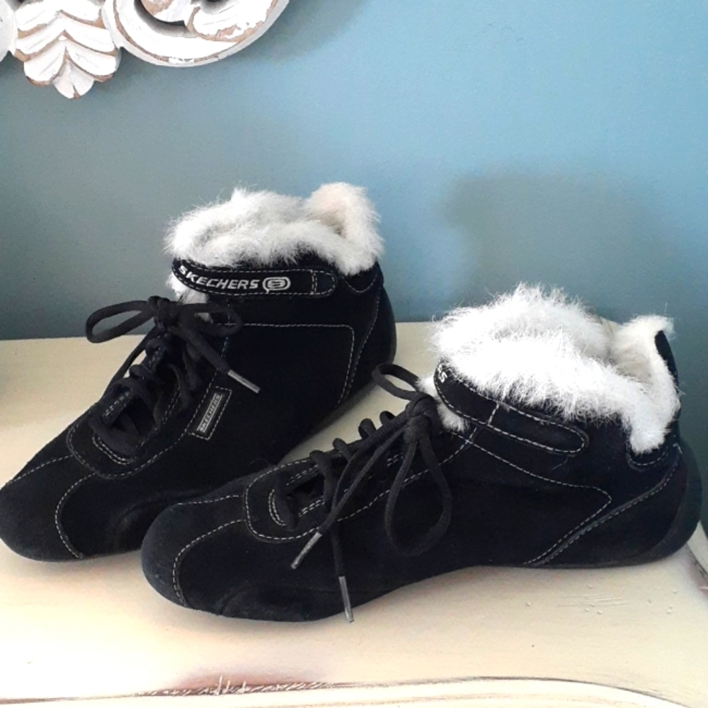 ^ Black suede Skechers lace-up booties with furry trim